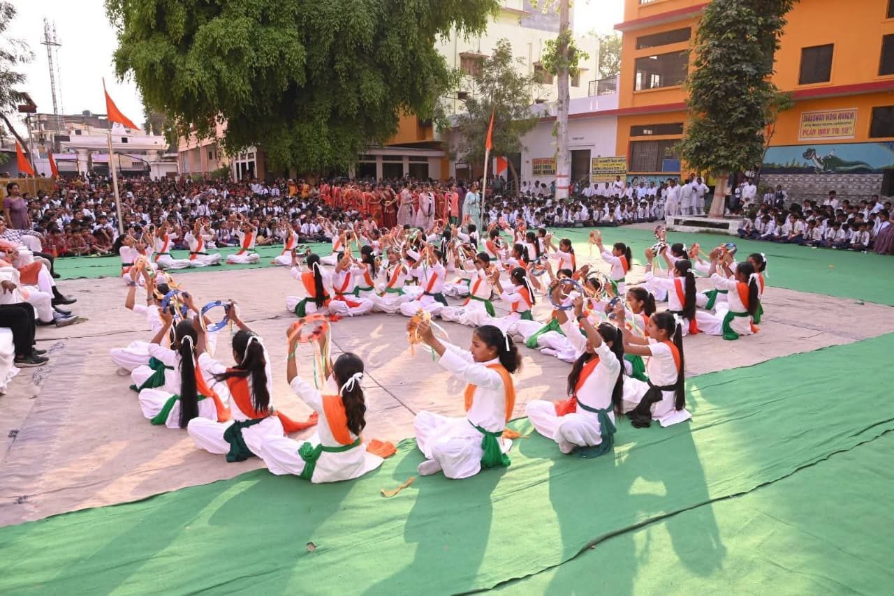 Cultural performance by students on stage