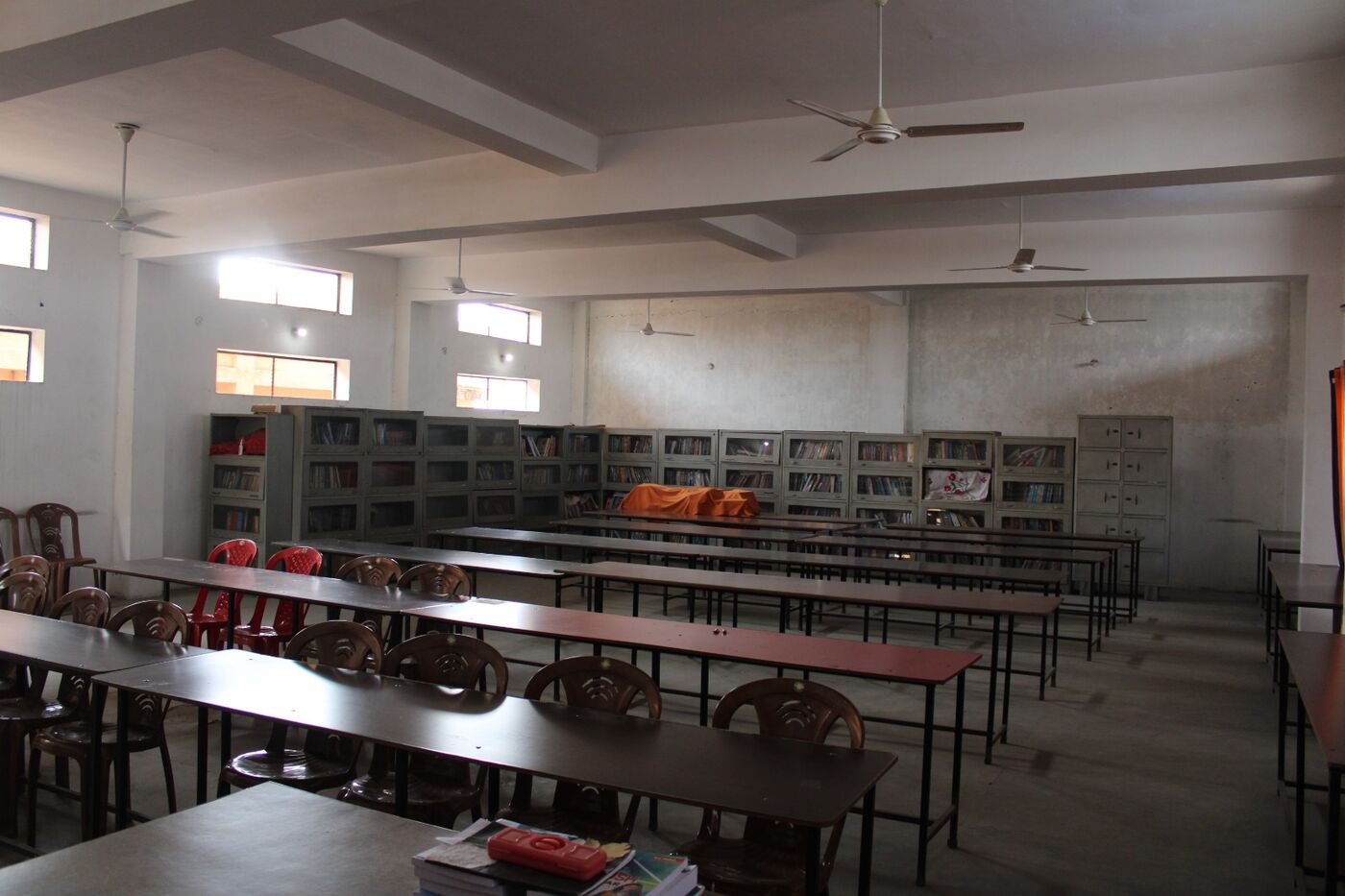 Library reading room with book cupboards and seating for students