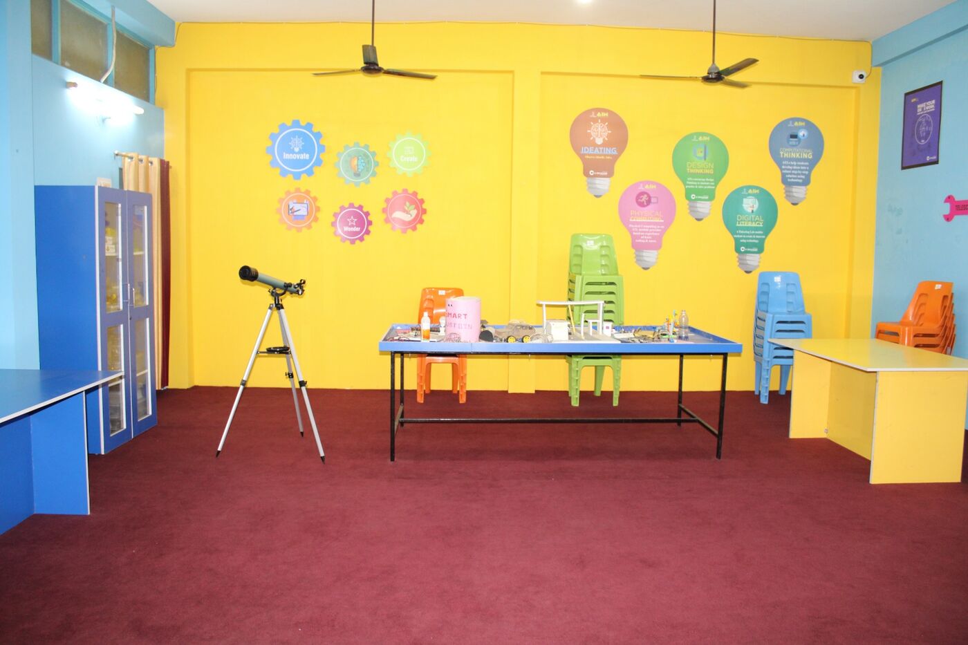 Astronomy and science corner with a telescope and demonstration table